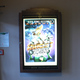The movie poster I received in its light box at the front door!